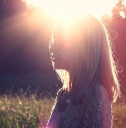 Photo of woman with sunlight behind, by Stocksnap.io, CCO
